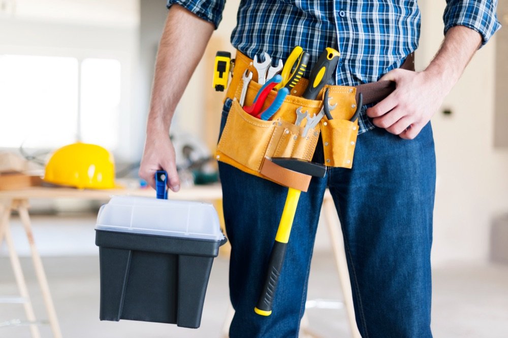 Property maintenance technician with tools